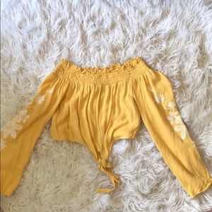 Off the shoulder yellow shirt